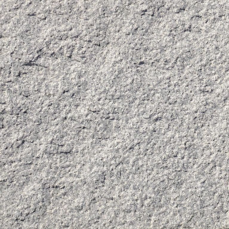 Swatch image cropped for Granite Pavers - Square - Gray. The surface finishes shown are bush hammered and split-face with flat plane. The dominant color shown is gray; with beige and white secondaries. The color mix creates a cool feeling. Speckled color pattern. Contains some mica.