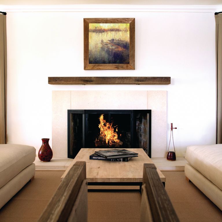 Application image for Limestone - Blanco. The image shows this material being used in a fireplace hearth application. The dominant color shown is tan. The color mix creates a warm feeling.