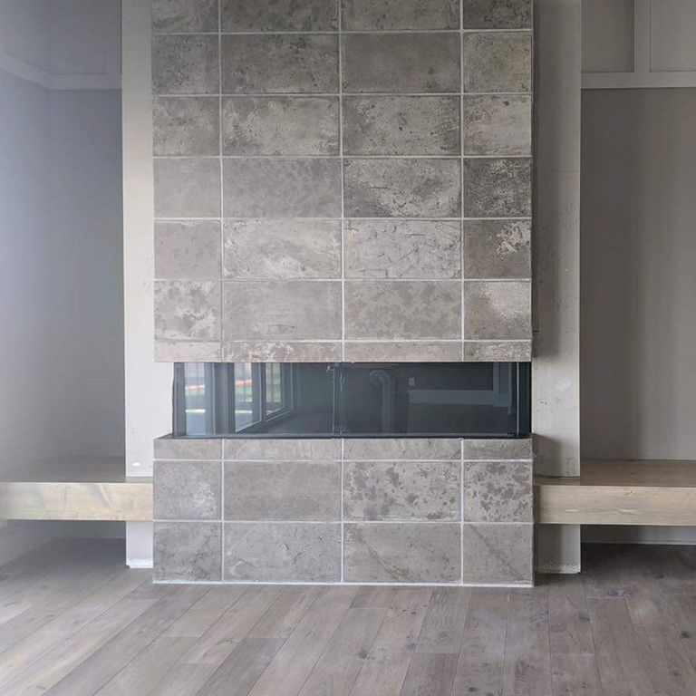 Application image for Platinum Limestone. The image shows this material being used in a fireplace surround application. This is a building and landscape stone for indoor and outdoor commercial and residential applications. Suitable for general use, freeze-thaw conditions, low heat absorption surfaces, high traffic areas, low slipperiness surfaces and high heel compatibilty situations. Low to moderate on the price spectrum.
