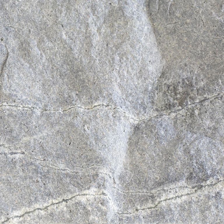 Feature image for Atlantic Granite. Dominant colors shown are gray and white; with beige, blue and cream secondaries. Exhibits 