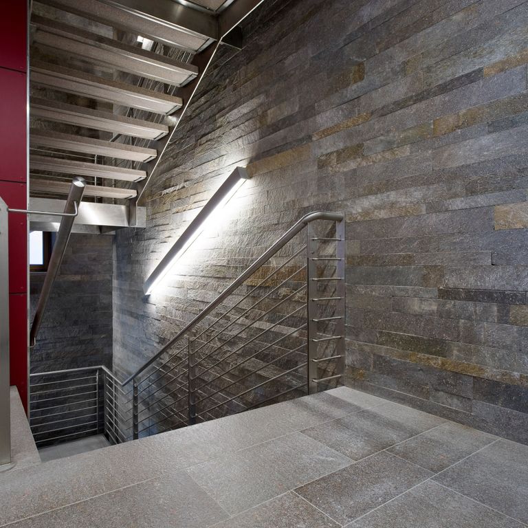 The image shows this material being used in an interior floor application.
