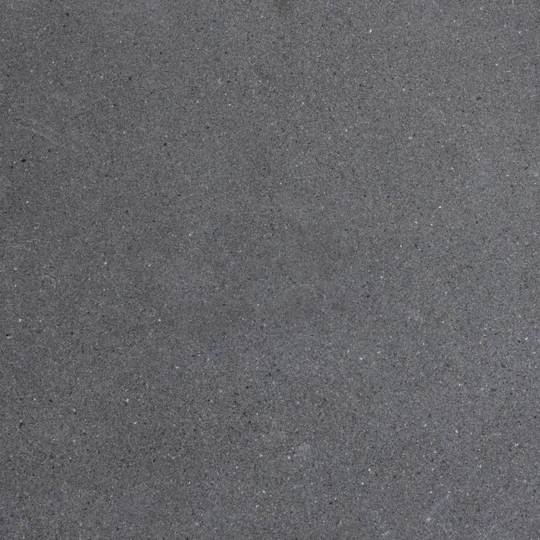 Color/Finish variation image for Polar Gray Limestone. The surface finish shown is honed. The dominant color shown is gray; with brown and purple secondaries. The color mix creates a cool feeling. Solid and fine speckled color patterns.