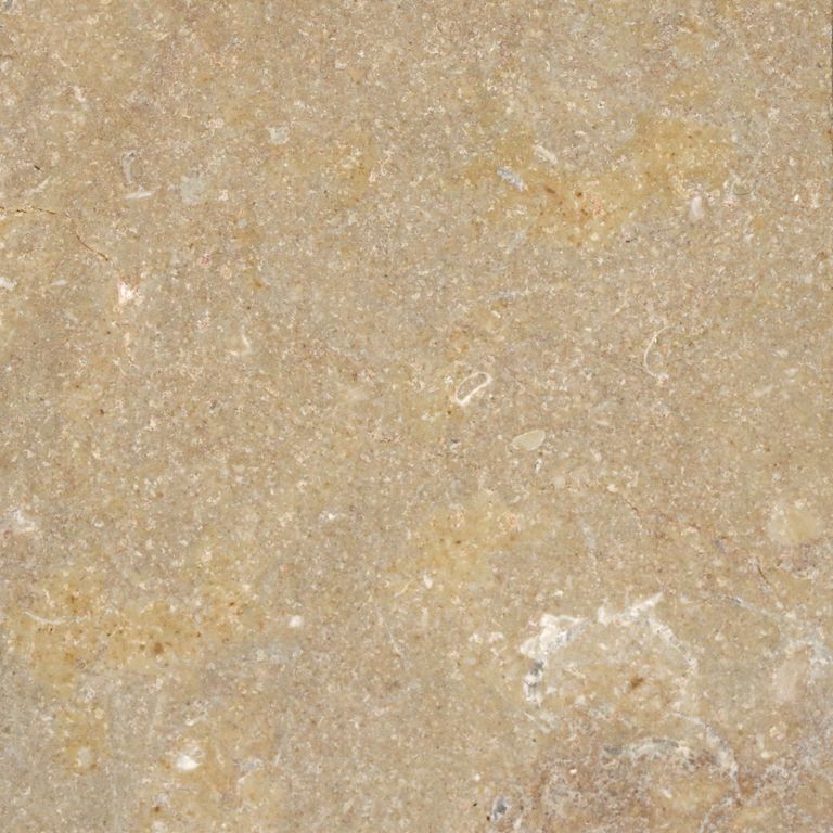 Color/Finish variation image for Cenia Beige Limestone. The surface finish shown is brushed. Dominant colors shown are beige and tan; with brown and orange/rust secondaries. Exhibits 