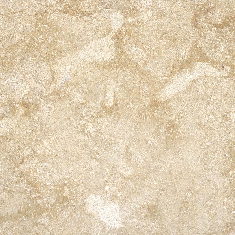 Color/Finish variation image for Cenia Beige Limestone. The surface finishes shown are brushed and bush hammered. Dominant colors shown are beige and tan; with a cream secondary. Exhibits 
