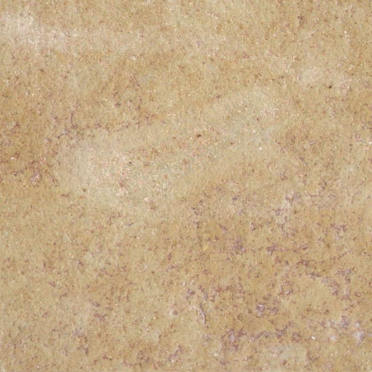 Color/Finish variation image for Cenia Beige Limestone. The surface finish shown is flamed. Dominant colors shown are orange/rust and tan; with beige, brown and purple secondaries. Exhibits 