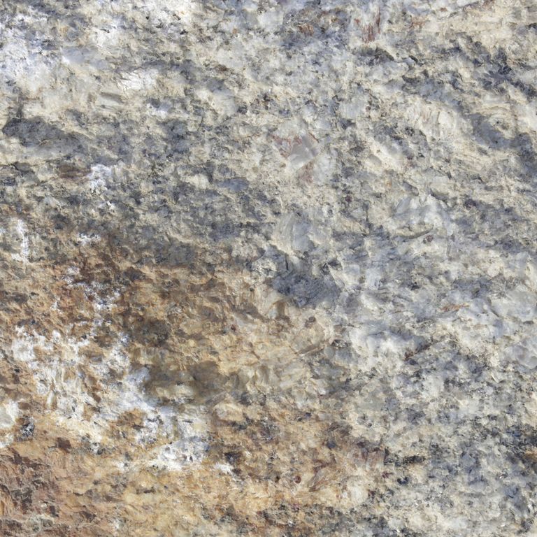 Color/Finish variation image for Reclaimed First Generation Granite Curbstone. The dominant color shown is gray; with beige, brown, orange/rust, white, tan and cream secondaries. Exhibits 