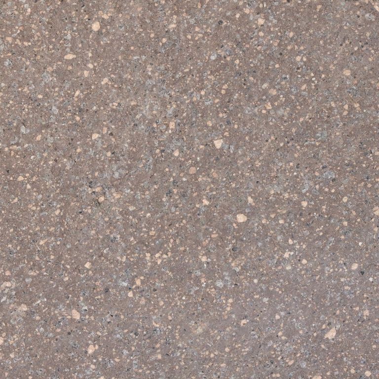 Close-up image for Imperial Roman Porphyry - Red. The surface finishes shown are brushed and flamed. Dominant colors shown are gray and purple; with beige, brown, green, orange/rust and tan secondaries. The color mix creates a warm feeling. Speckled and coarse speckled color patterns.