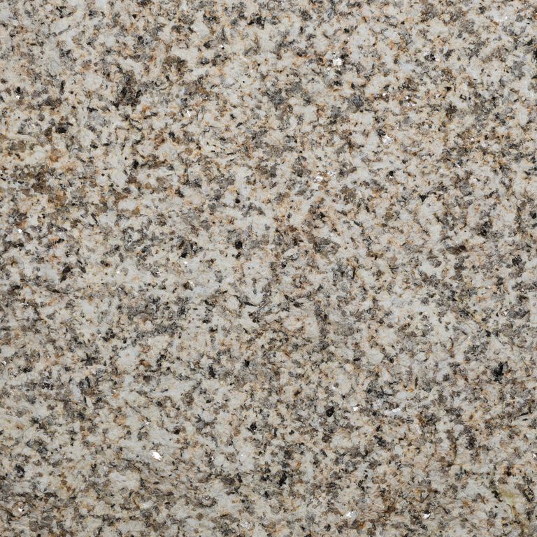 Color/Finish variation image for Yellow Oat Granite. The surface finish shown is rockfaced. Dominant colors shown are beige and yellow. The color mix creates a warm feeling.