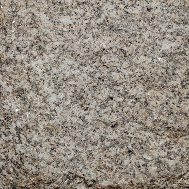 Color/Finish variation image for Yellow Oat Granite. The surface finish shown is split-face. Dominant colors shown are beige and yellow. The color mix creates a warm feeling.