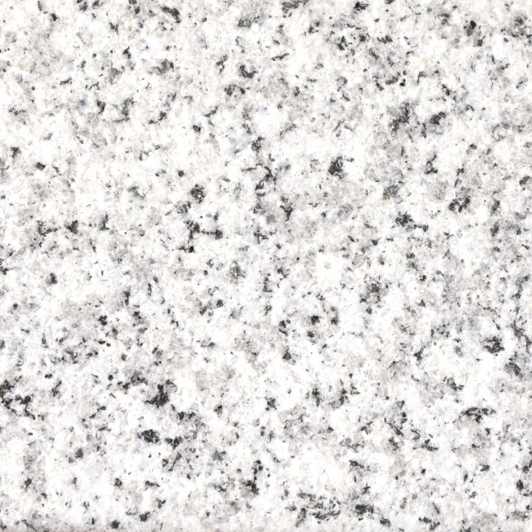 Feature image for Gray Ariz Granite. Dominant colors shown are gray, white and cream; with a pink secondary. The color mix creates a cool feeling. Speckled and coarse speckled color patterns.