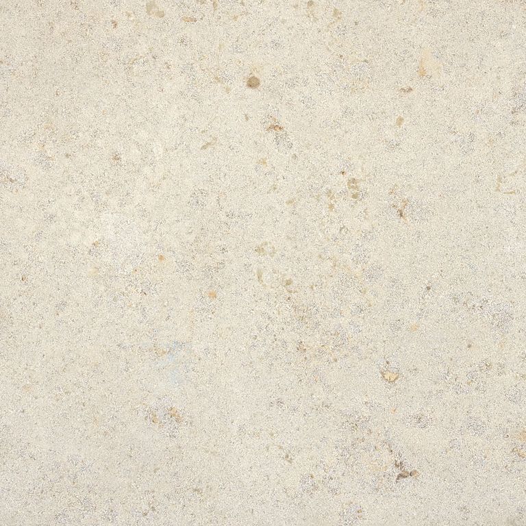 Best close-up image for Bavarian Limestone Toscana - Beige. The surface finish shown is sand blasted. Dominant colors shown are beige and cream; with gray, white and tan secondaries. The color mix creates a warm feeling. Regular and cloudy color patterns. Contains mineral inclusions.