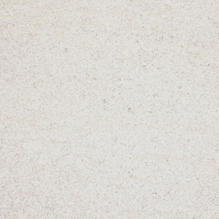 Feature image for Alley Limestone - Light. The surface finish shown is a combination of brushed and sand blasted. Dominant colors shown are gray and pink; with beige, purple, white and cream secondaries. The color mix creates a warm feeling. Fine speckled color pattern. Contains mineral inclusions.