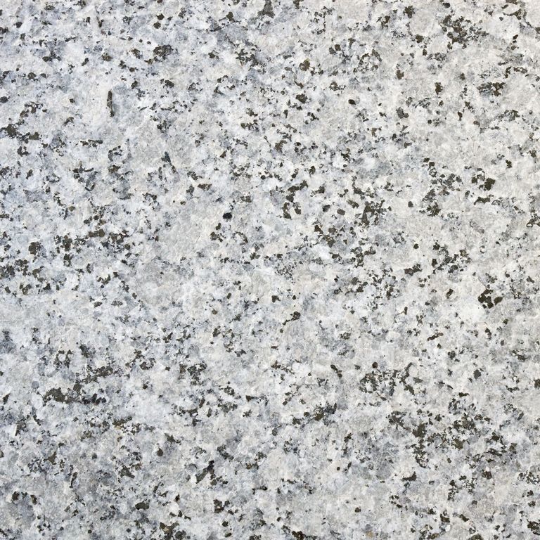The surface finish shown is flamed. Dominant colors shown are gray and white. The color mix creates a cool feeling. Coarse speckled color pattern.
