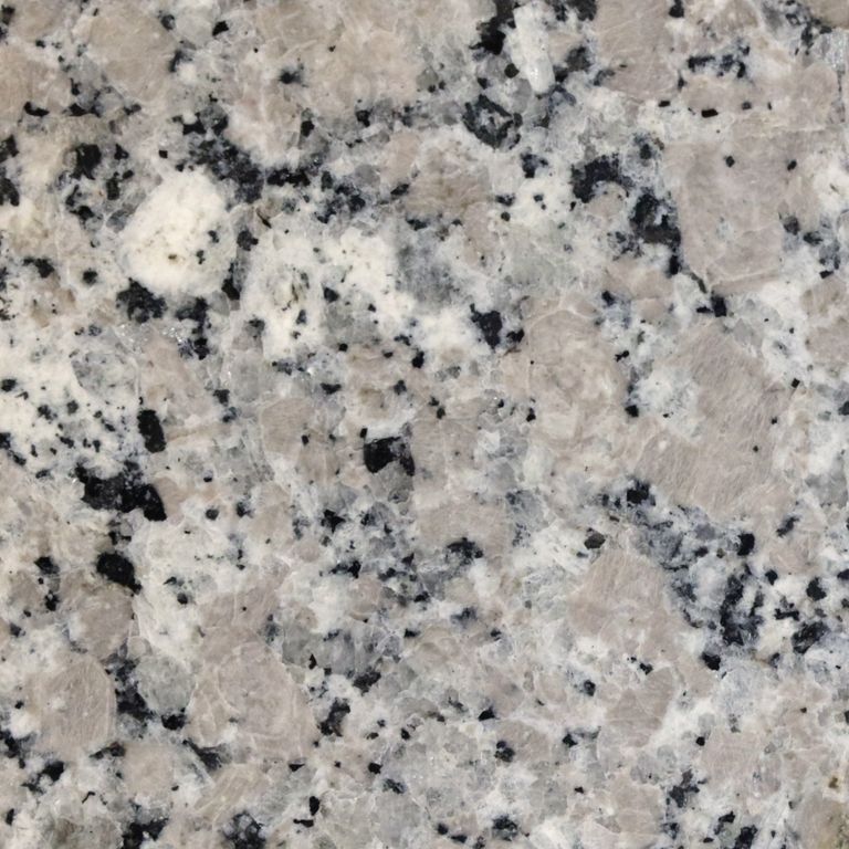 The surface finish shown is polished. The dominant color shown is gray. The color mix creates a cool feeling. Coarse speckled color pattern.