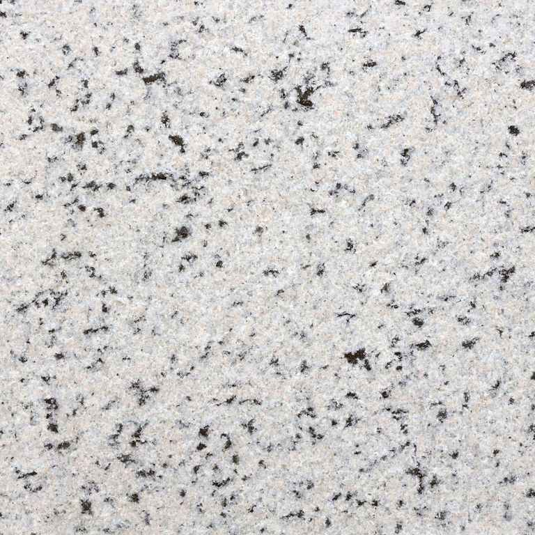 The surface finish shown is flamed. Dominant colors shown are gray and white. The color mix creates a cool feeling. Coarse speckled color pattern.