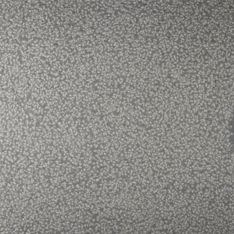 Feature image for Sugus Black Sandstone. The dominant color shown is gray. The color mix creates a cool feeling. Speckled color pattern.