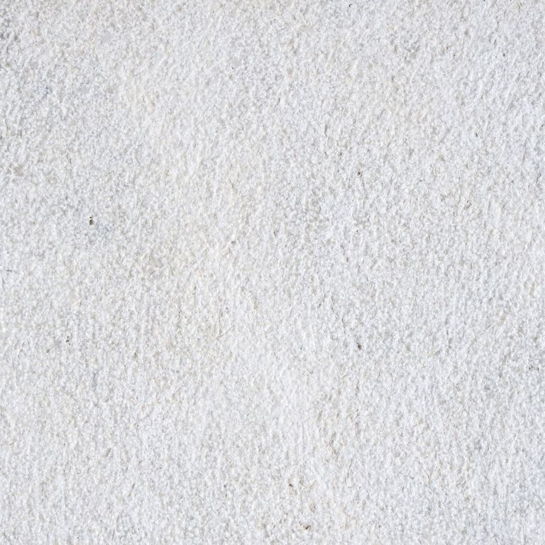 Color/Finish variation image for Limestone - Dalmatian. The surface finish shown is fine bush hammered. Dominant colors shown are gray and white; with beige and cream secondaries. The color mix creates a cool feeling. Cloudy color pattern.