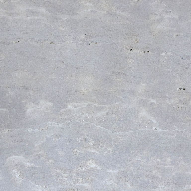 Color/Finish variation image for Limestone - Midwest Gray. The surface finish shown is honed. Dominant colors shown are blue and gray; with white and tan secondaries. Exhibits 