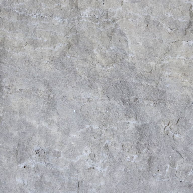 The surface finish shown is split-face. Dominant colors shown are blue, gray and white. The color mix creates a cool feeling. Fine speckled color pattern. Contains some mica.
