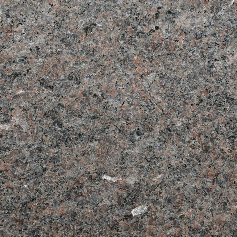 Feature image for Mahogany Granite. The surface finish shown is flamed. Dominant colors shown are brown, gray and pink. The color mix creates a warm feeling.