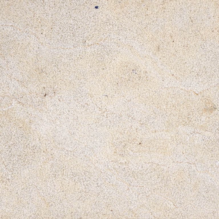 Feature image for Crema Del Giglio. The surface finish shown is fine bush hammered. The dominant color shown is beige; with gray, pink, purple, white, tan and cream secondaries. The color mix creates a warm feeling. Fine speckled and random color patterns. Contains mineral inclusions.