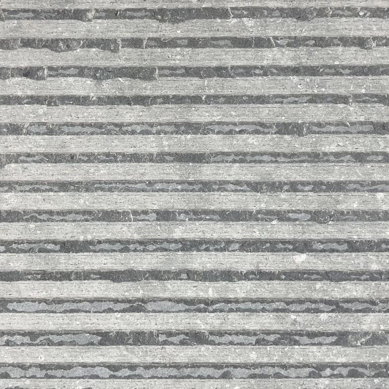 The surface finish shown is chiseled. The dominant color shown is gray. The color mix creates a cool feeling. Linear color pattern.
