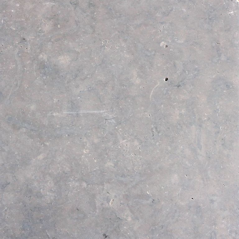 The surface finish shown is honed. The dominant color shown is gray. The color mix creates a cool feeling. Solid color pattern. Contains some mica.