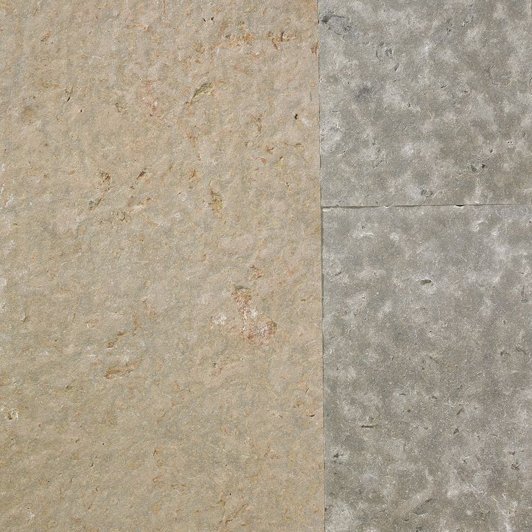Best close-up image for Beaver Creek Limestone - Full Color. The image shows this material being used for driveway pavers, path pavers and patio pavers. The surface finish shown is flamed. Dominant colors shown are brown, gray and tan; with beige and orange/rust secondaries. The color mix creates a warm feeling. Random color pattern. Contains mineral inclusions.