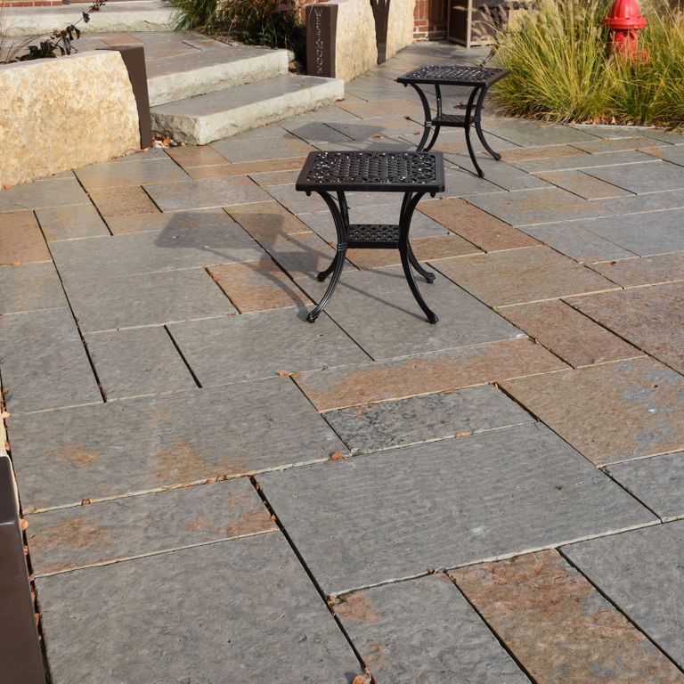 Feature image for Beaver Creek Limestone - Full Color. The surface finish shown is flamed. The dominant color shown is gray; with brown, orange/rust and tan secondaries. The color mix creates a warm feeling.