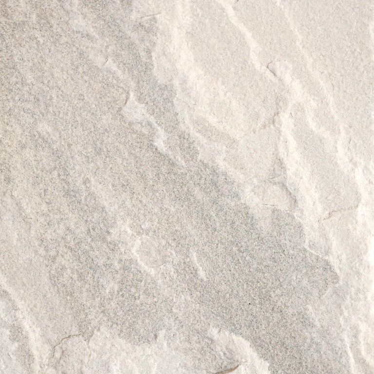 Color/Finish variation image for Golden Fossil Sandstone. Dominant colors shown are beige, white and cream; with gray, pink, purple and tan secondaries. Exhibits 