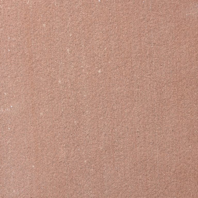 Feature image for Sandstone - Plum. The surface finish shown is scratched. Dominant colors shown are beige and orange/rust; with a brown secondary. The color mix creates a warm feeling. Solid and regular color patterns.
