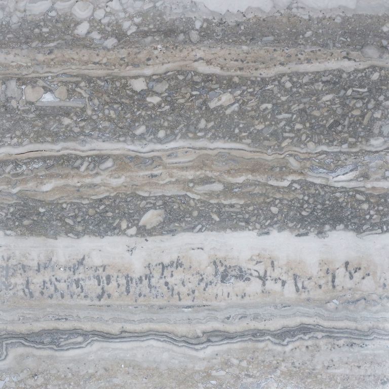The surface finish shown is honed. The dominant color shown is gray. The color mix creates a cool feeling. Blotched and streaked color patterns.