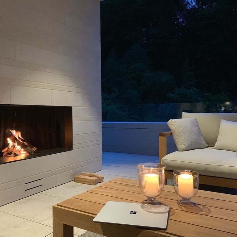 Application image for Veneto Beige Limestone - Veneer. The image shows this product being used for fireplace surround and full bed veneer. The surface finish shown is . Dominant colors shown are beige and cream. The color mix creates a warm feeling.