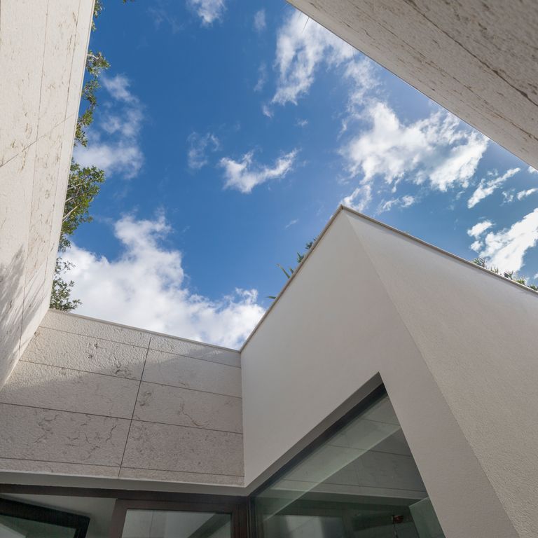Application image for Veneto Beige Limestone - Veneer. The image shows this product being used in a full bed veneer application. The surface finish shown is . The dominant color shown is beige. The color mix creates a cool feeling.