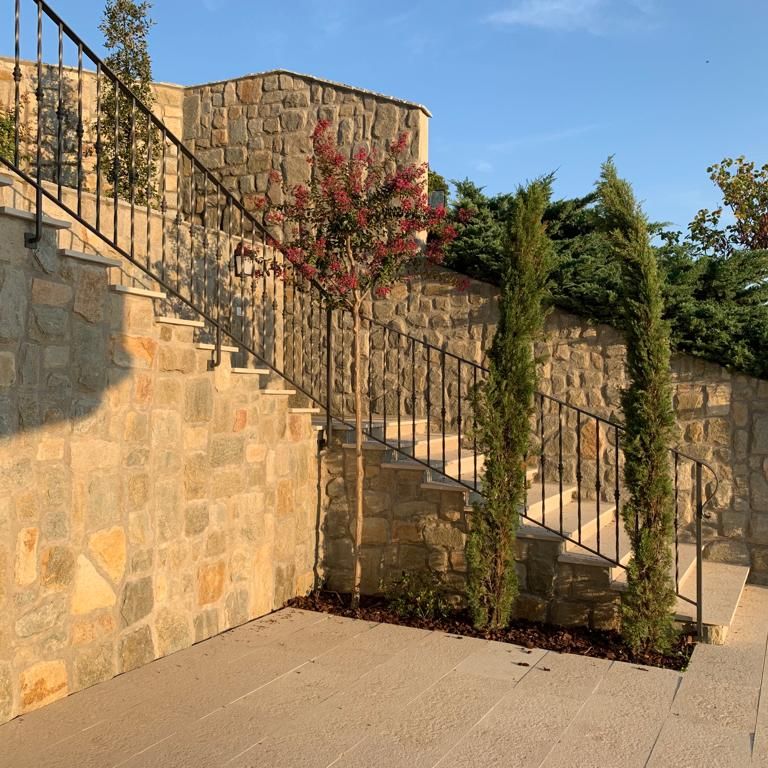 Application image for Veneto Beige Limestone - Steps & Treads. The image shows this product being used for landings and treads. Dominant colors shown are beige, tan and cream. The color mix creates a warm feeling.