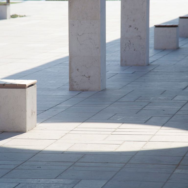 Application image for Veneto Beige Limestone - Pavers. The image shows this product being used in a public area application. The surface finish shown is flamed. Dominant colors shown are beige and cream. The color mix creates a cool feeling.