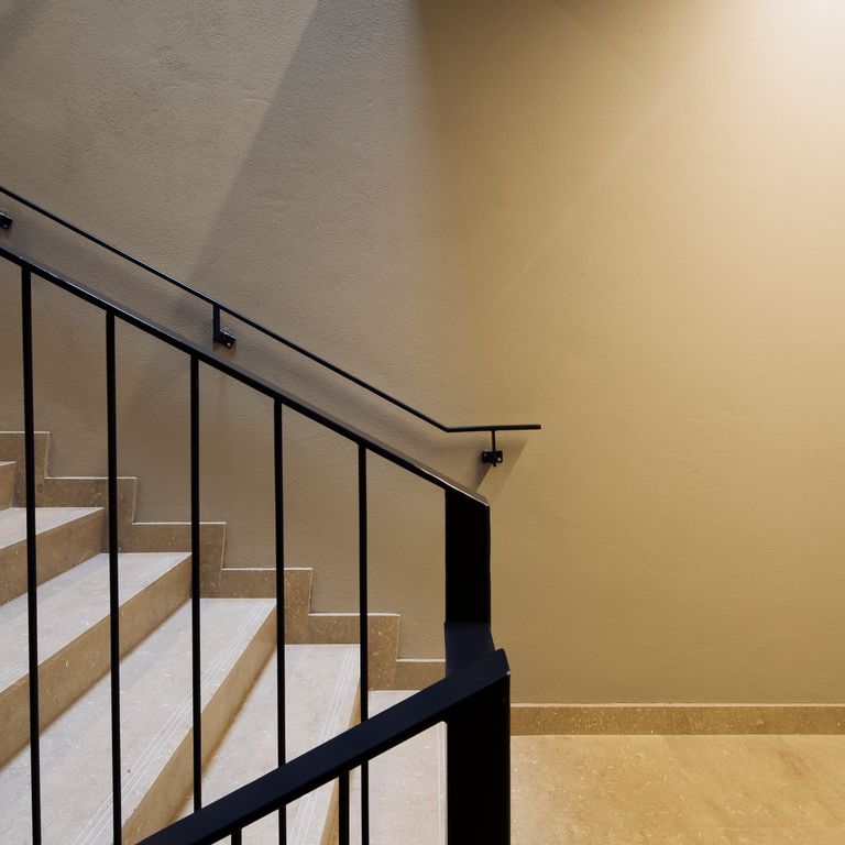 Application image for Veneto Olivo Limestone - Steps & Treads. The image shows this product being used for landings and treads. The surface finish shown is honed. Dominant colors shown are beige and tan. The color mix creates a warm feeling.