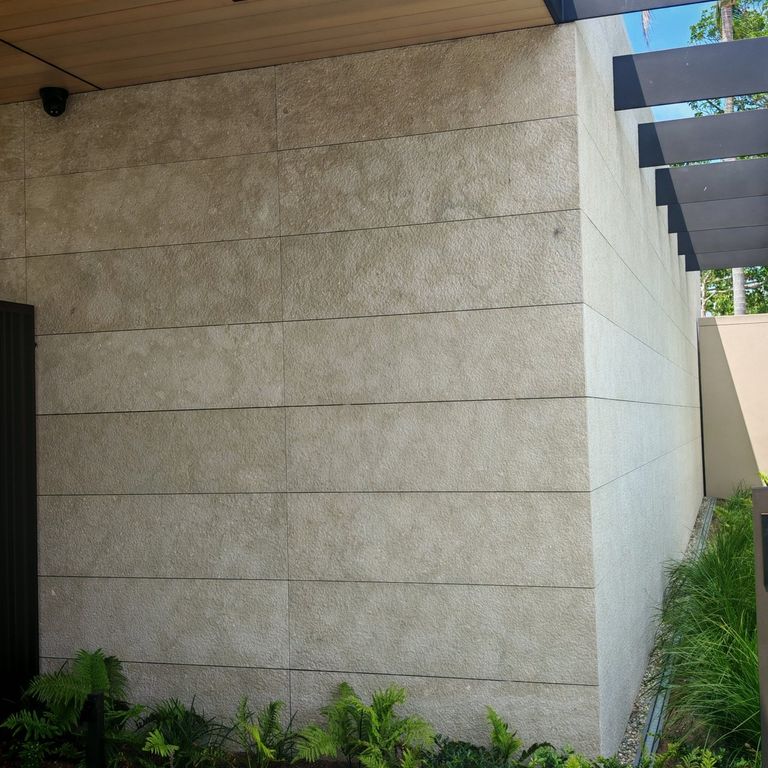Application image for Veneto Olivo Limestone - Veneer. The image shows this product being used in a full bed veneer application. The surface finish shown is . Dominant colors shown are gray and tan. The color mix creates a cool feeling.