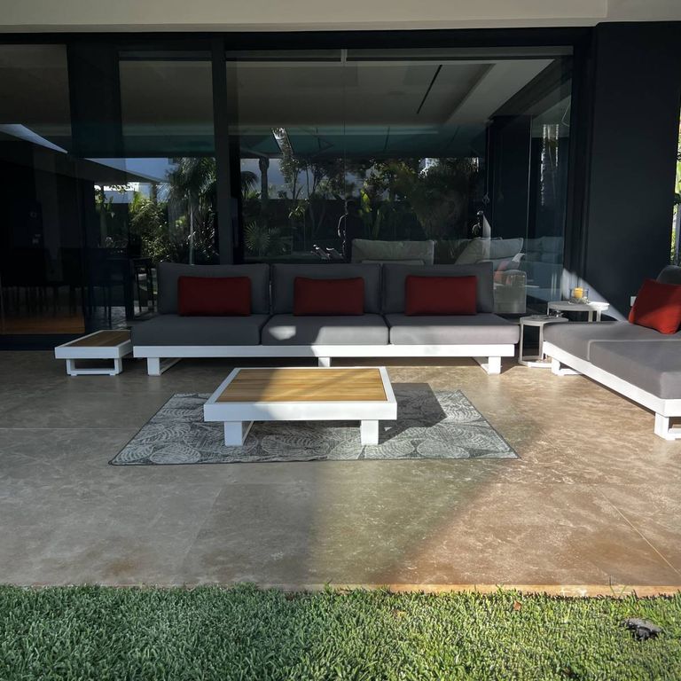 Feature image for Rabat Beige Limestone - Pavers. The image shows this product being used in a patio pavers application. Dominant colors shown are brown and tan. The color mix creates a warm feeling.