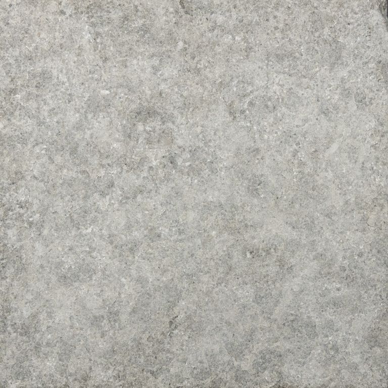 Swatch image for Casablanca Limestone - Pavers. The surface finish shown is flamed. The dominant color shown is gray. The color mix creates a cool feeling.