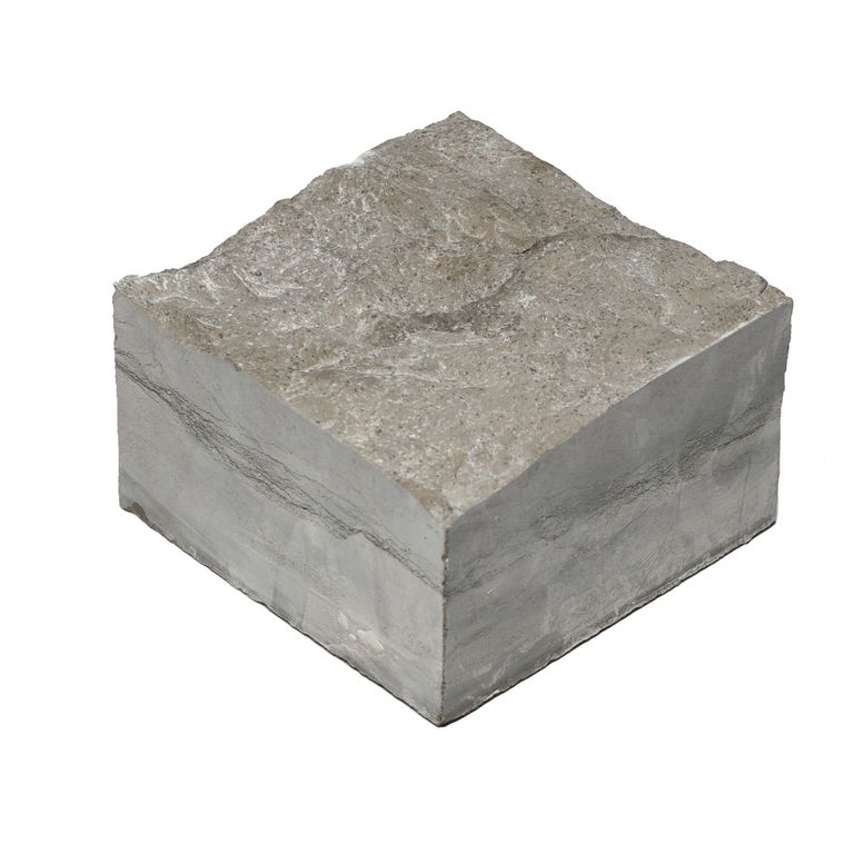 Oblique image for Blue Harbor Limestone - Splitface Cobblestone. The surface finish shown is split-face. The dominant color shown is gray.