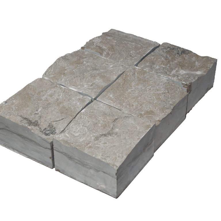 Feature image for Blue Harbor Limestone - Splitface Cobblestone. The surface finish shown is split-face. The dominant color shown is gray. The color mix creates a cool feeling.
