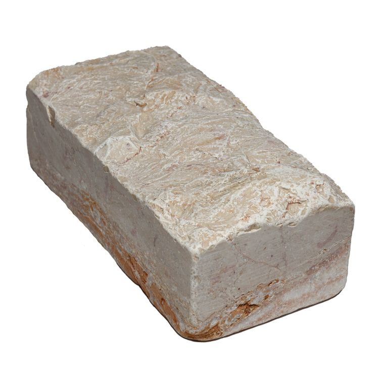 Oblique image for Portugese Alpine Limestone - Cobblestone - Splitface & Tumbled. The surface finish shown is . Dominant colors shown are beige, pink and tan. The color mix creates a warm feeling.