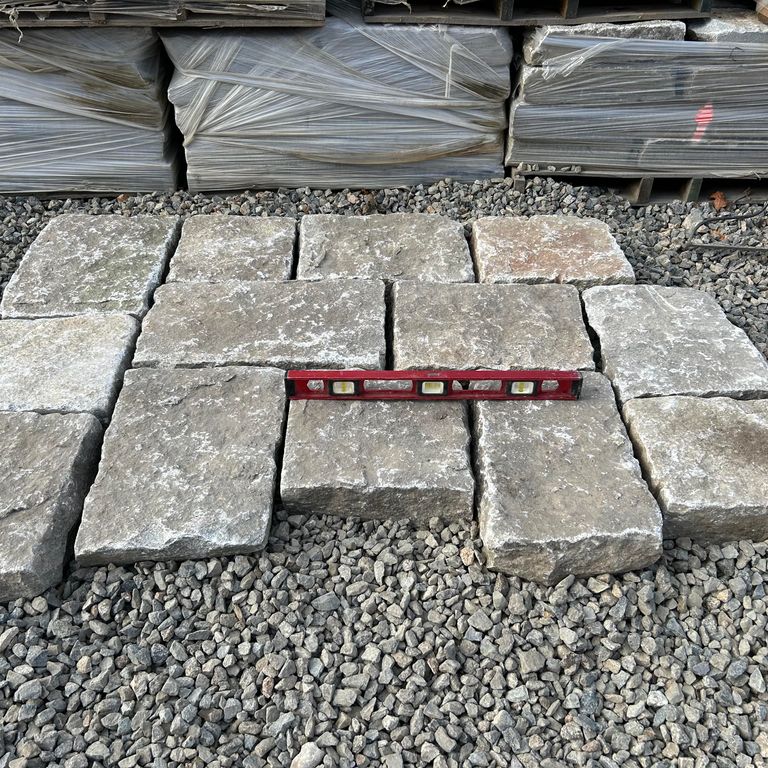 Application image for Reclaimed New England Granite - Bridge Squares. The surface finish shown is . The dominant color shown is gray. The color mix creates a warm feeling.