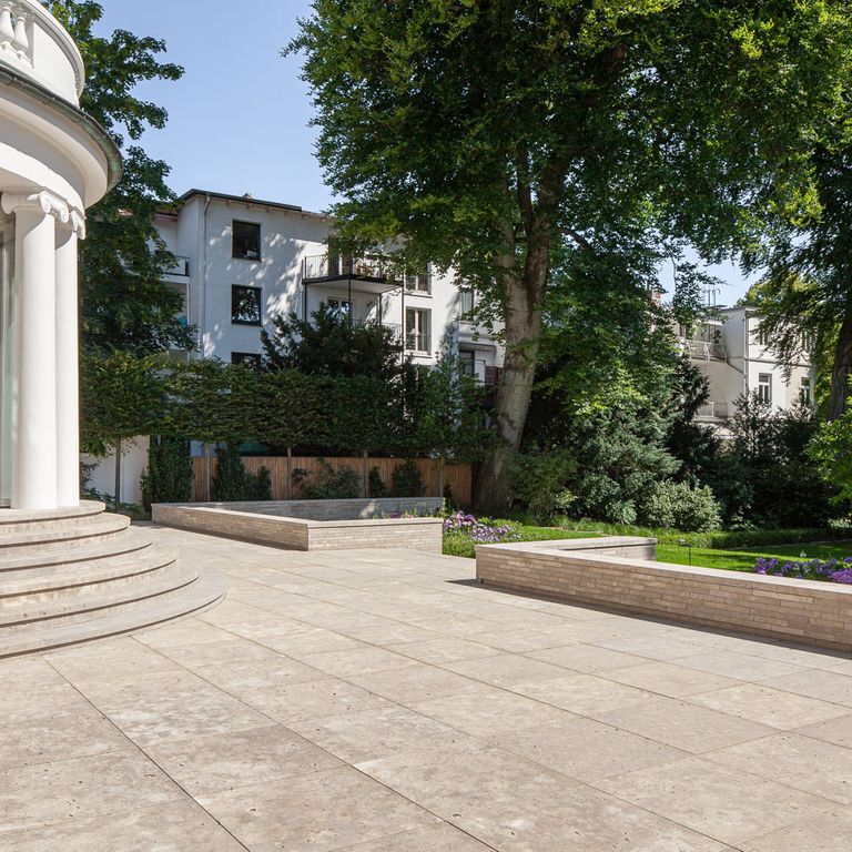 Application image for Bavarian Dolomite Gray Limestone - Steps & Treads. The image shows this product being used in a treads application. The surface finish shown is sand blasted. Dominant colors shown are gray and tan. The color mix creates a warm feeling.