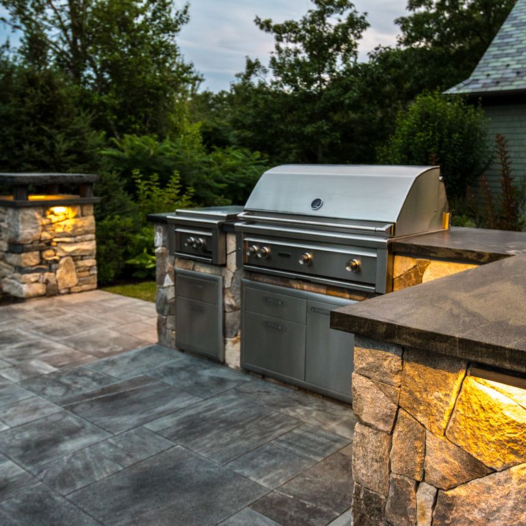The image shows this product being used in a patio pavers application.