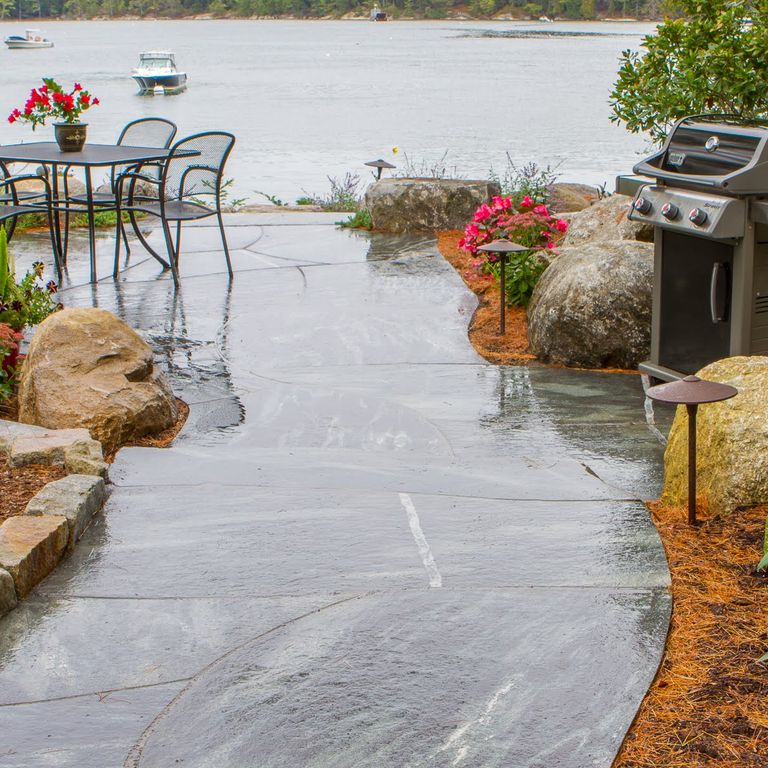 The image shows this product being used in a path pavers application.
