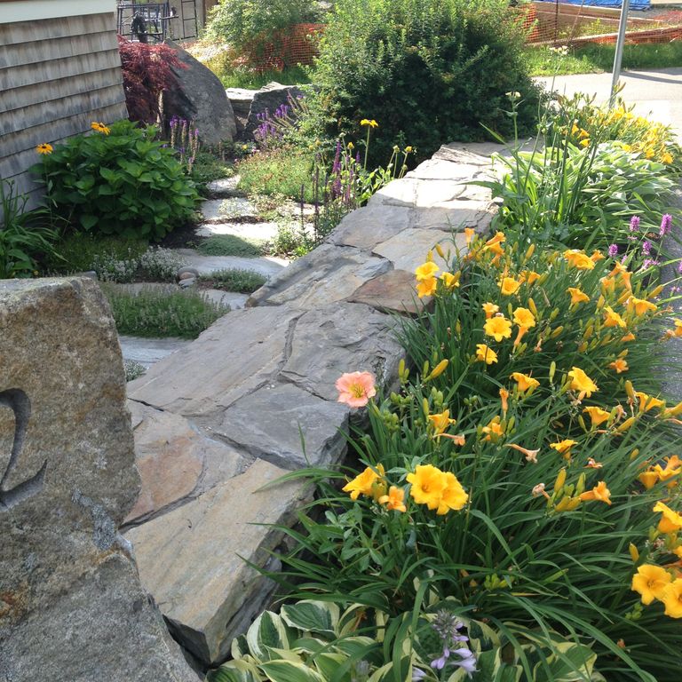 The image shows this product being used in a path pavers application.