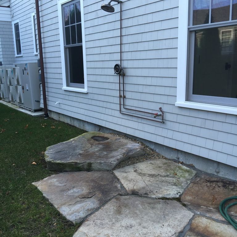 The image shows this product being used in a path pavers application.