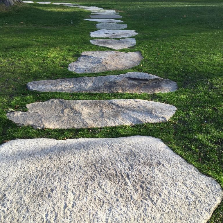 The image shows this product being used in a path pavers application.